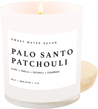 Sweet Water Decor Palo Santo Patchouli Candle - Soy Clove, Vanilla, Cedarwood, Patchouli Scented Spa Candle for Home - 11oz White Jar with Wood Lid, 50+ Hour Burn Time, Made in The USA